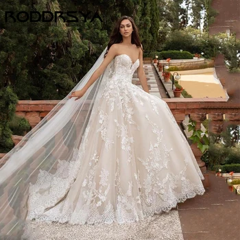 RODDRSYA Romantik Straplez Aplike düğün elbisesi Zarif Tül A-line Kolsuz gelin kıyafeti Düğme Backless Robe De Soirée